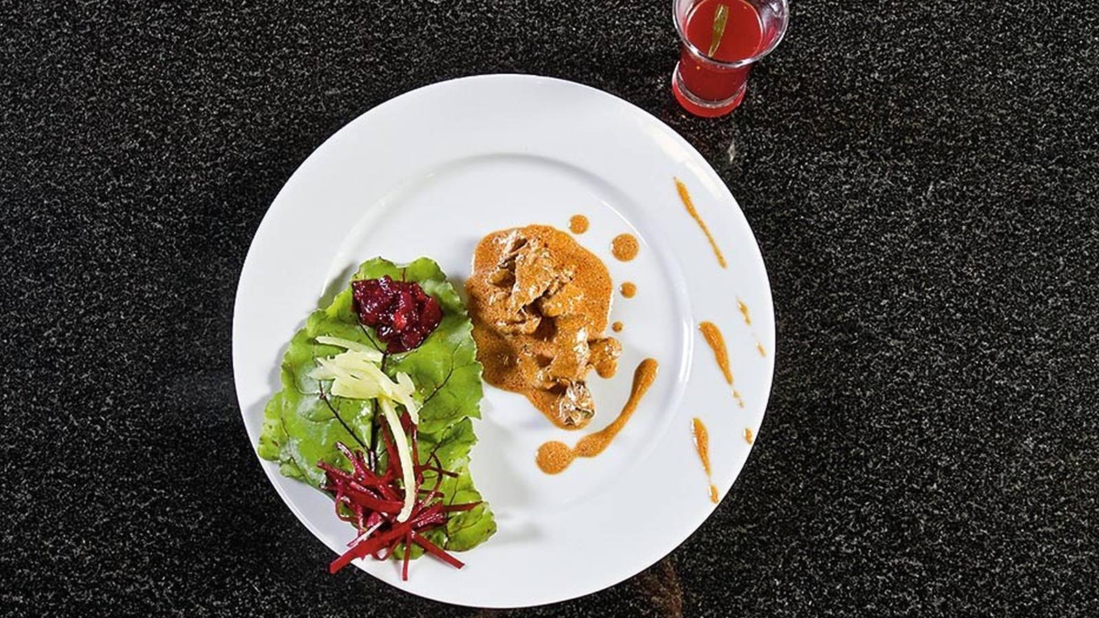 Beef Stroganoff with beet and strawberry side dish